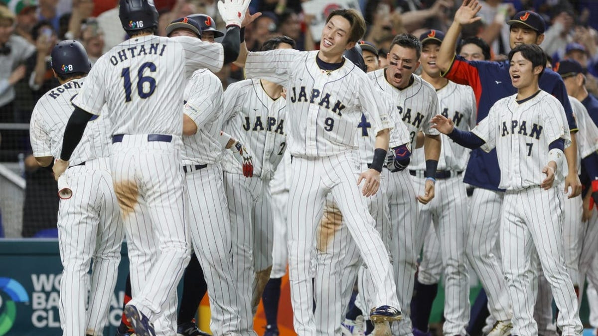 Alex Verdugo of Mexico hits one-run double in the 8th inning during the  World Baseball Classic (WBC) semifinal match between Mexico and Japan at  LoanDepot Park in Miami, Florida, United States on