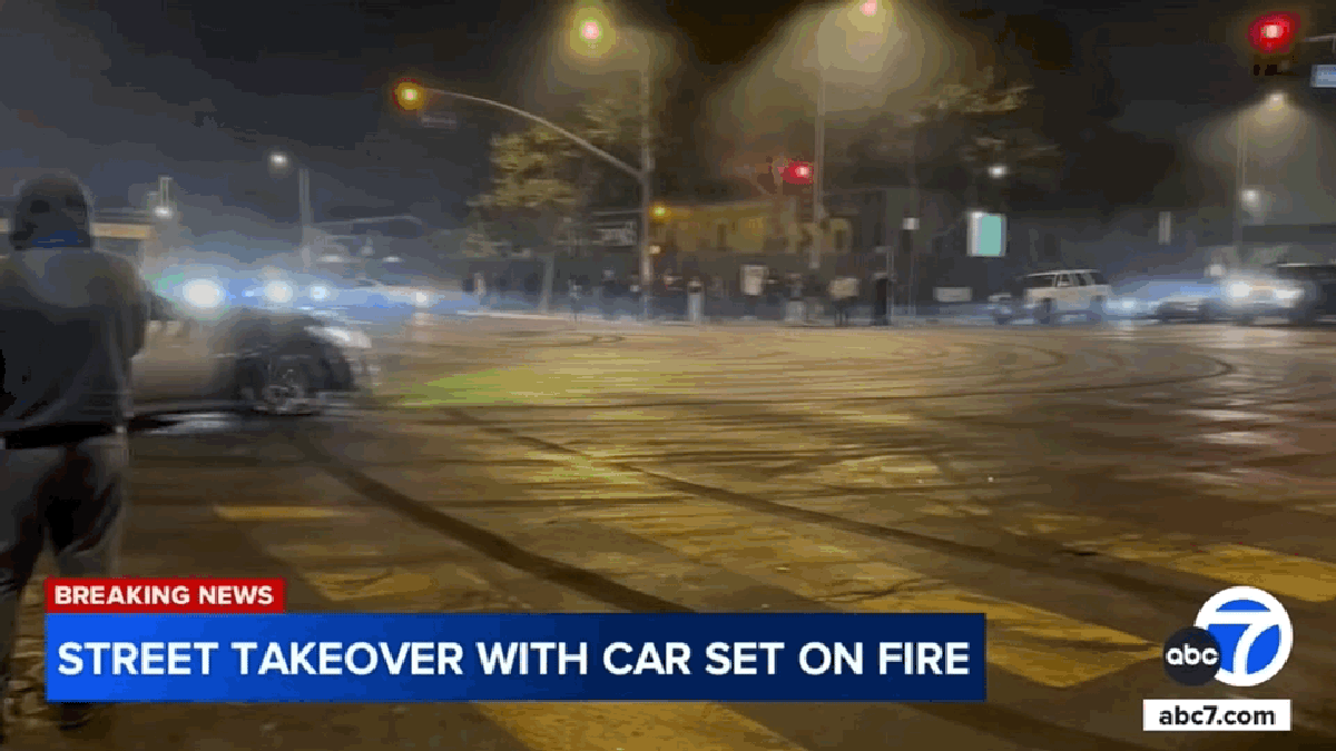 Two LA Street Takeovers Cause Vehicle Fires And Dealership Damage In The Same Night