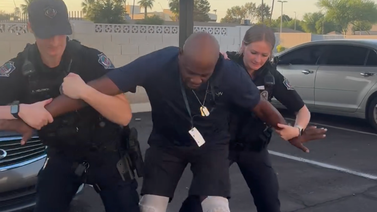 Arizona man loses job after police handcuff him