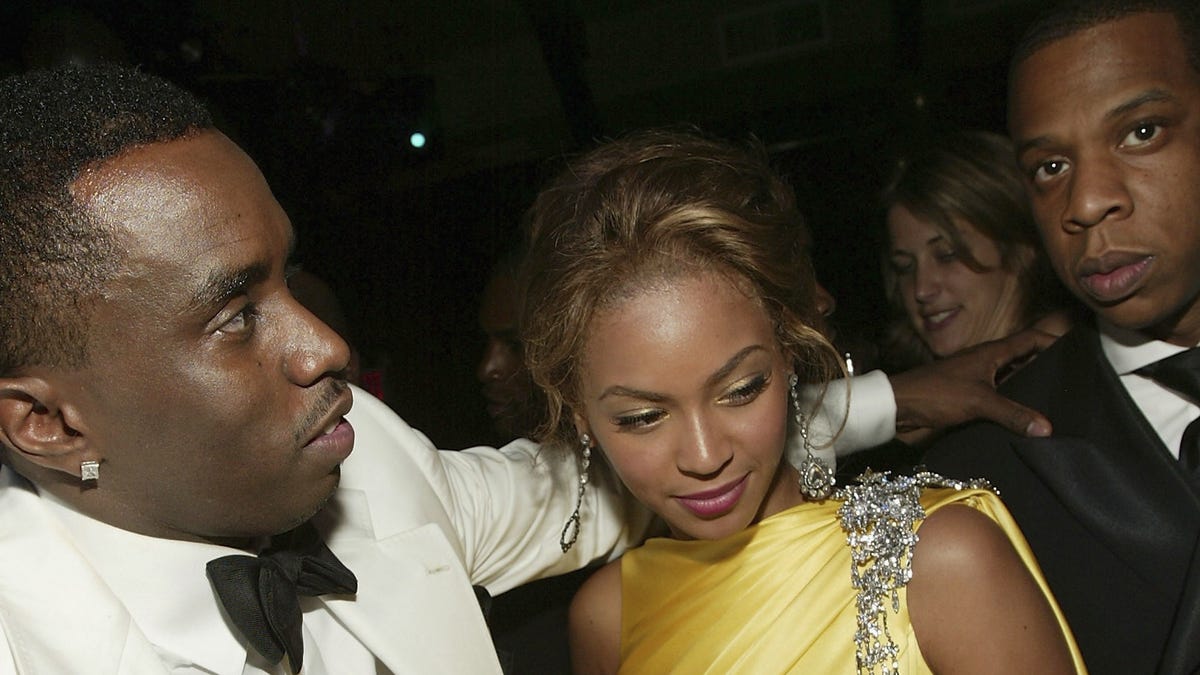 Jay-Z Snatches Phone From Man Filming Beyoncé at Diddy's 50th