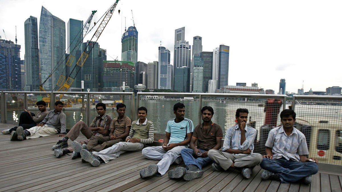 Public drunk. Иммигранты в Сингапуре. Перенаселение пляжи Сингапуре. Singapore workers.