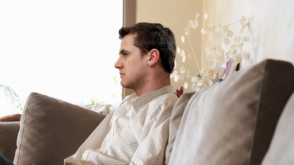 Man Desperately Trying To Wring Every Last Ounce Of Relaxation From Final Day Of Vacation