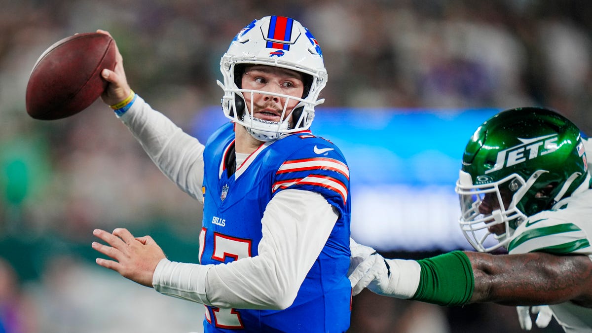 Buffalo Bills quarterback Josh Allen throws a pass downfield