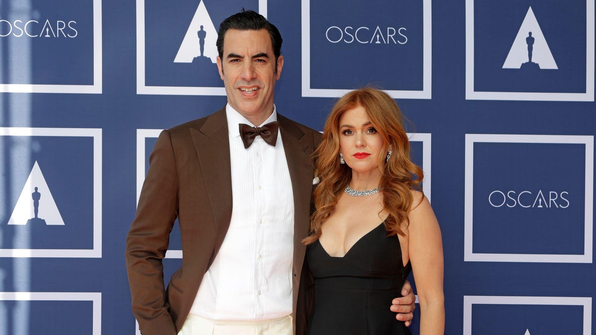 Sacha Baron Cohen and Isla Fisher announce divorce via sporty tennis photo, as one does