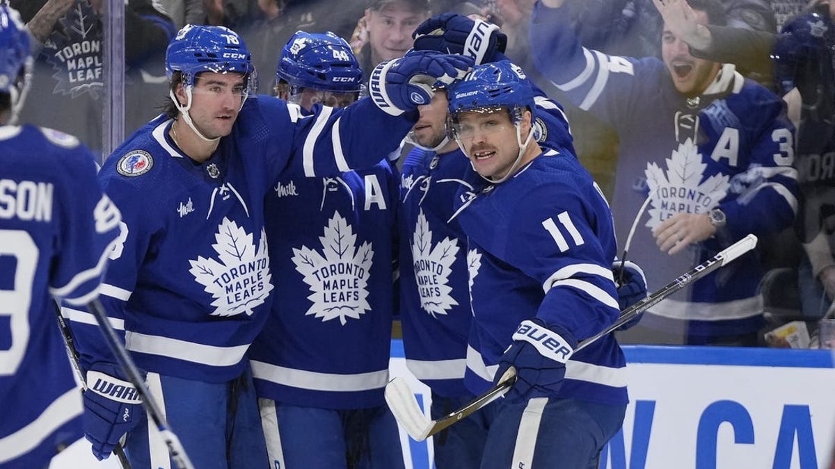 Leafs shoot to snap Canucks' five-game winning streak