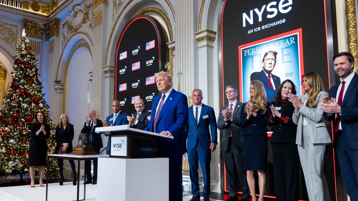 Donald Trump rings the NYSE opening bell as he's named Time's Person of the Year