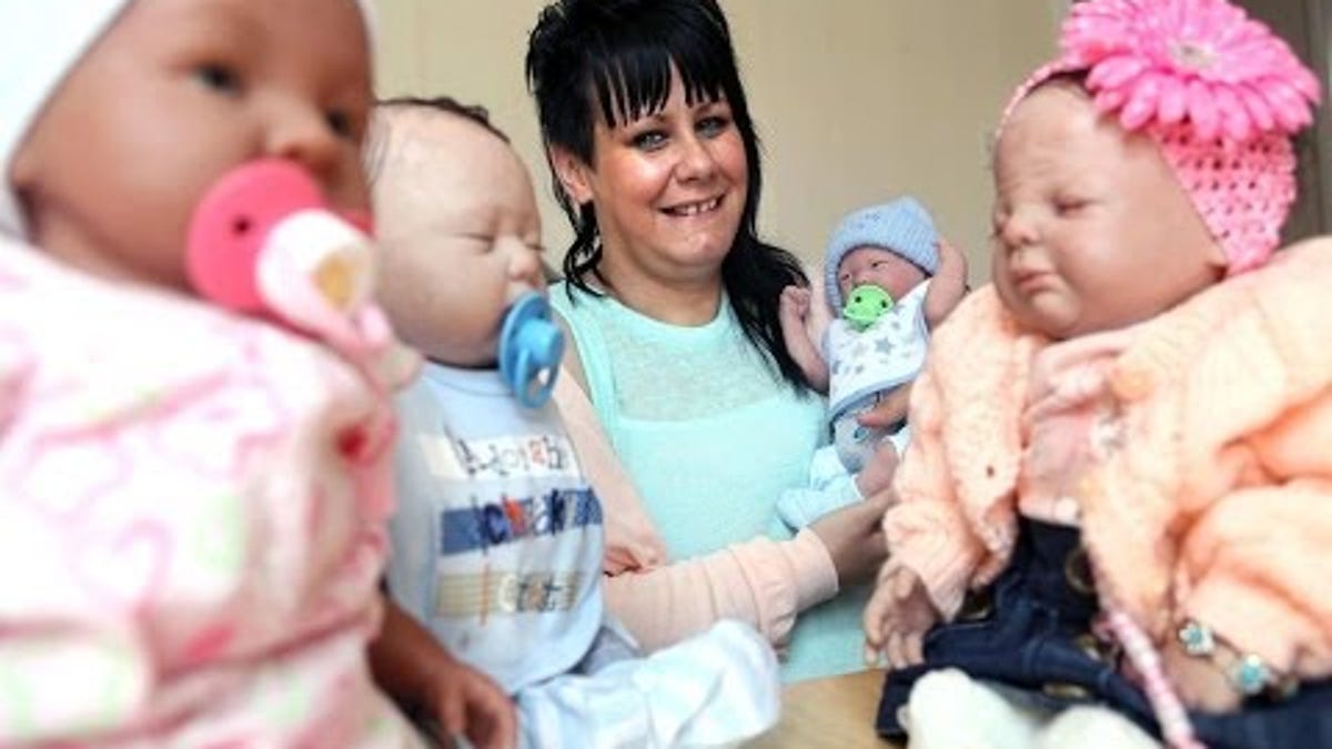 Woman Spends Thousands on Fake Babies Despite Having 4 Kids Of Her Own