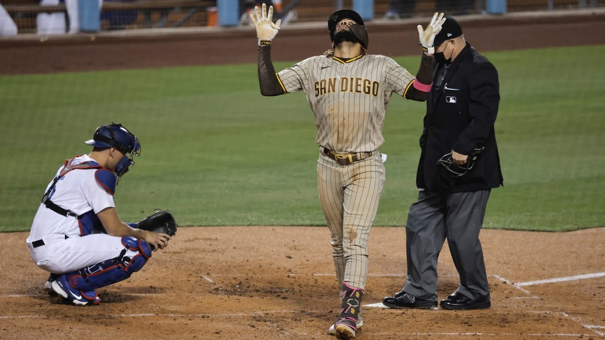 Fernando Tatis Jr. hits 2 HRs on date his dad hit 2 grand slams