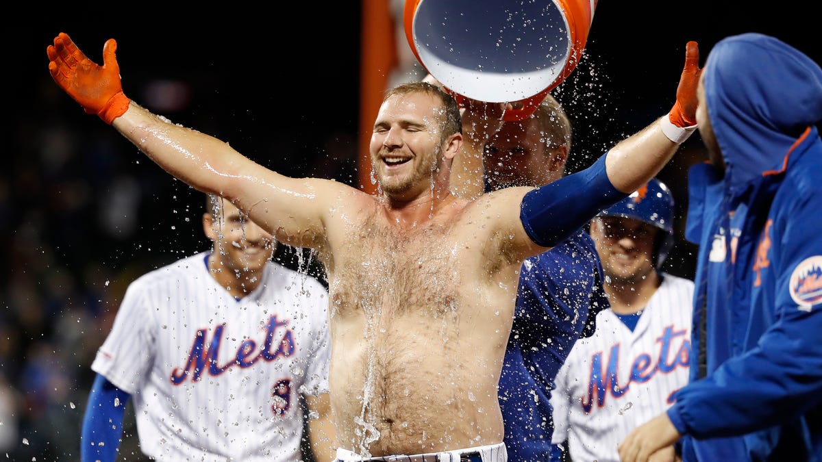 Conforto goes shirtless after Walk off win. 