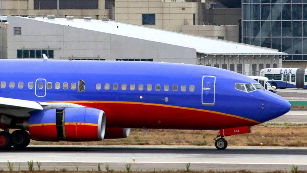 Trash Bag Taped Over Broken Southwest Plane Window