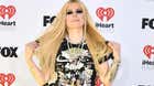 Image for Sk8er gurl Avril Lavigne sets her doppleganger rumors str8