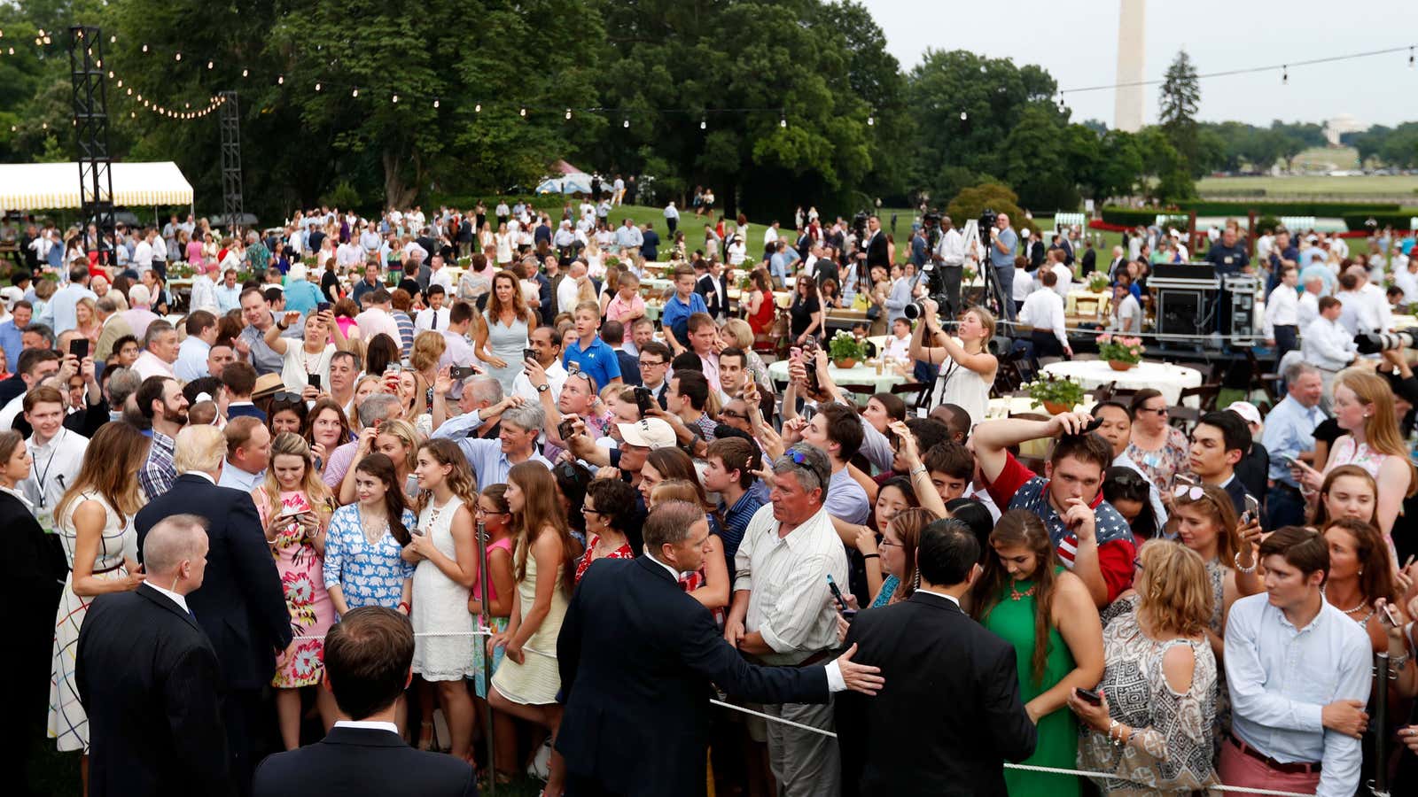 Somewhere in this photo, Collins is yelling “sell” into a phone.