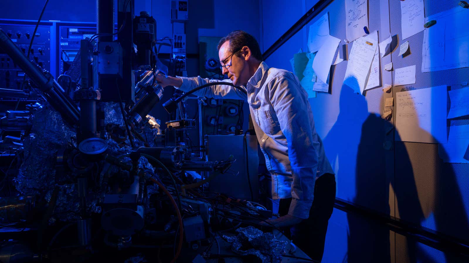 IBM researcher Christopher Lutz inspecting the microscope used to track the single-atom data store.