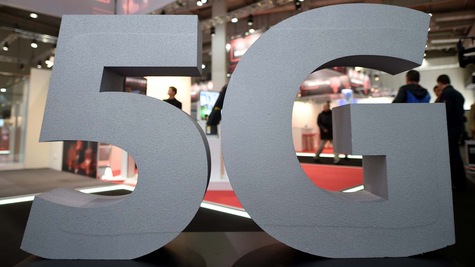 FILE PHOTO: A logo of the upcoming mobile standard 5G is pictured at the Hanover trade fair, in Hanover, Germany March 31, 2019. REUTERS/Fabian Bimmer/File Photo – RC161968F980