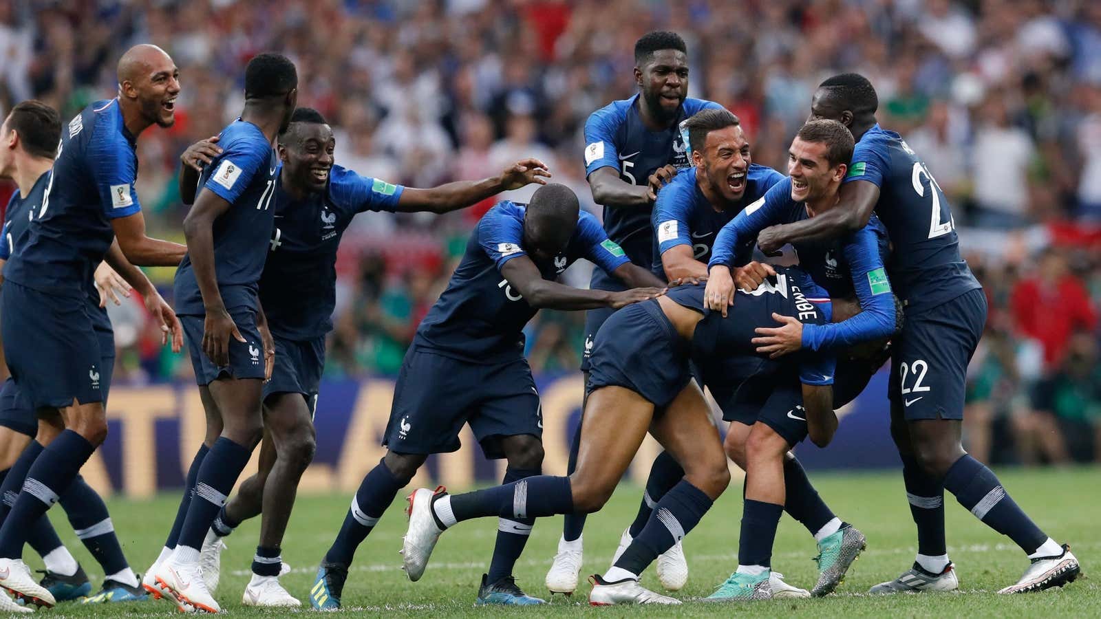 French players celebrate at the end of the final match between France and Croatia at the 2018 soccer World Cup Final