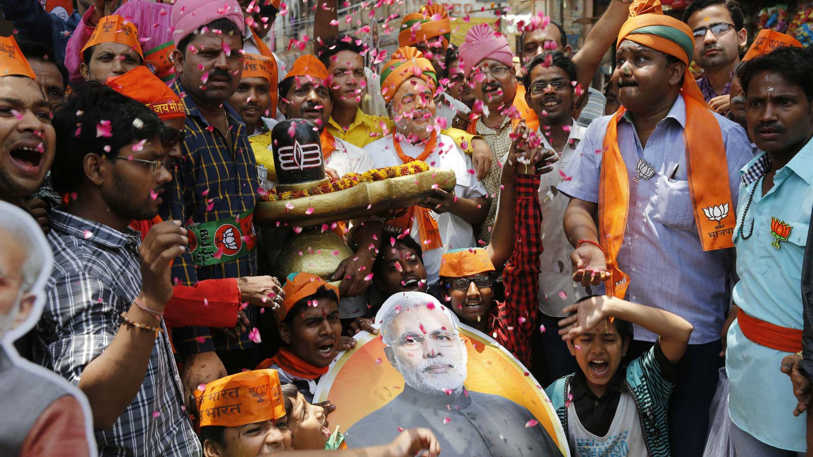 Narendra Modi supporters celebrate after the party’s historic victory.