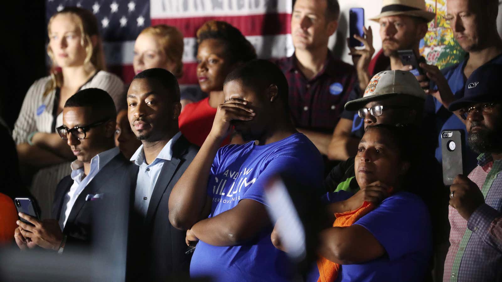 Supporters of Democratic Florida gubernatorial nominee and Tallahassee Mayor Andrew Gillum listen as he concedes the race.