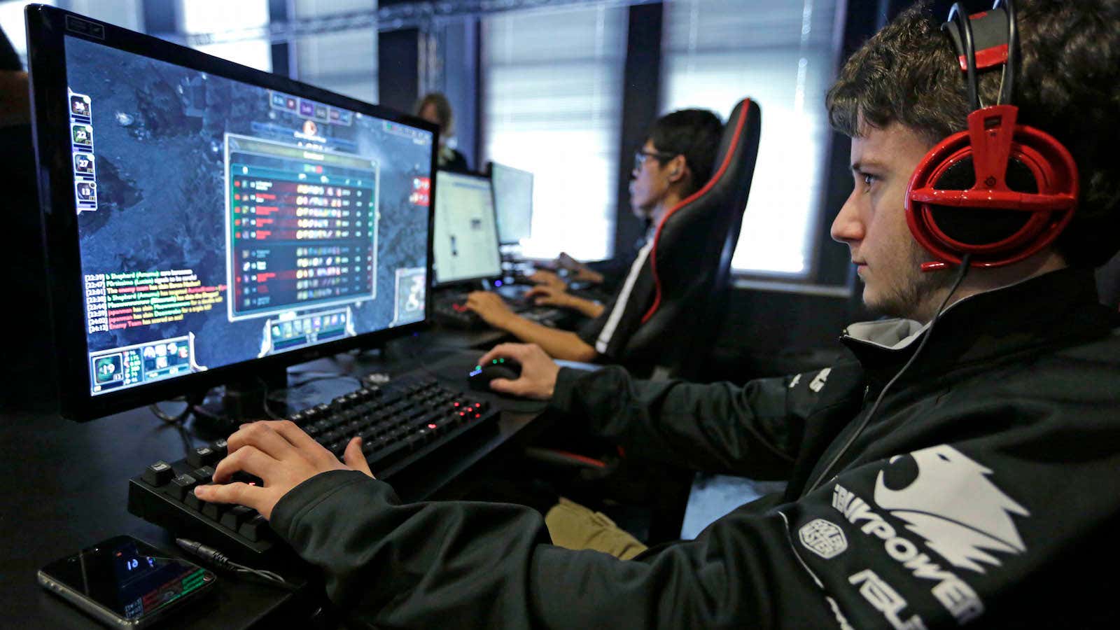 In this Sept. 23, 2014 photo, Robert Morris University Illinois junior, Blake Soberanis practices playing the video game “League of Legends” with his collegiate teammates…