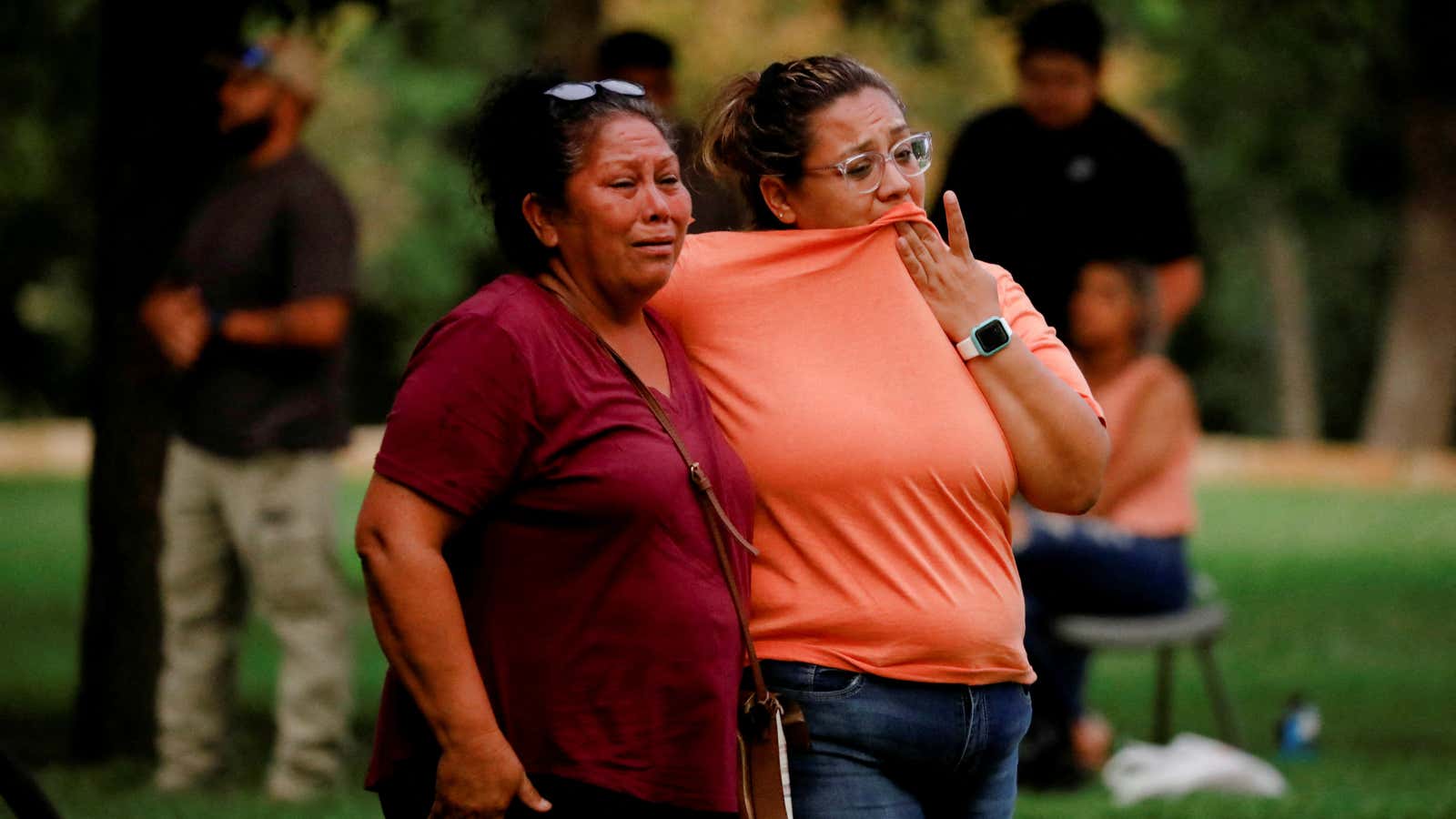 People react outside the Ssgt Willie de Leon Civic Center, where students had been transported from Robb Elementary School after a shooting, in Uvalde, Texas, U.S. May 24, 2022.  REUTERS/Marco Bello  REFILE – QUALITY REPEAT