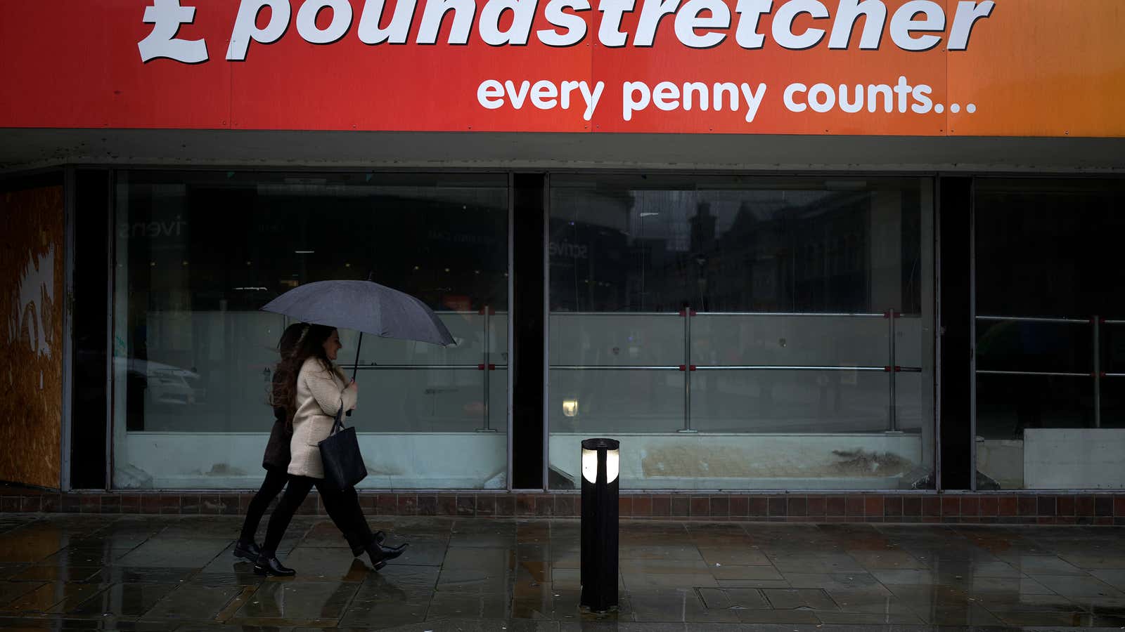 Dismal weather heralds the arrival of the UK Chancellor&#39;s Autumn Statement as people shop in the centre of Bolton on November 17, 2022 in Bolton, England.