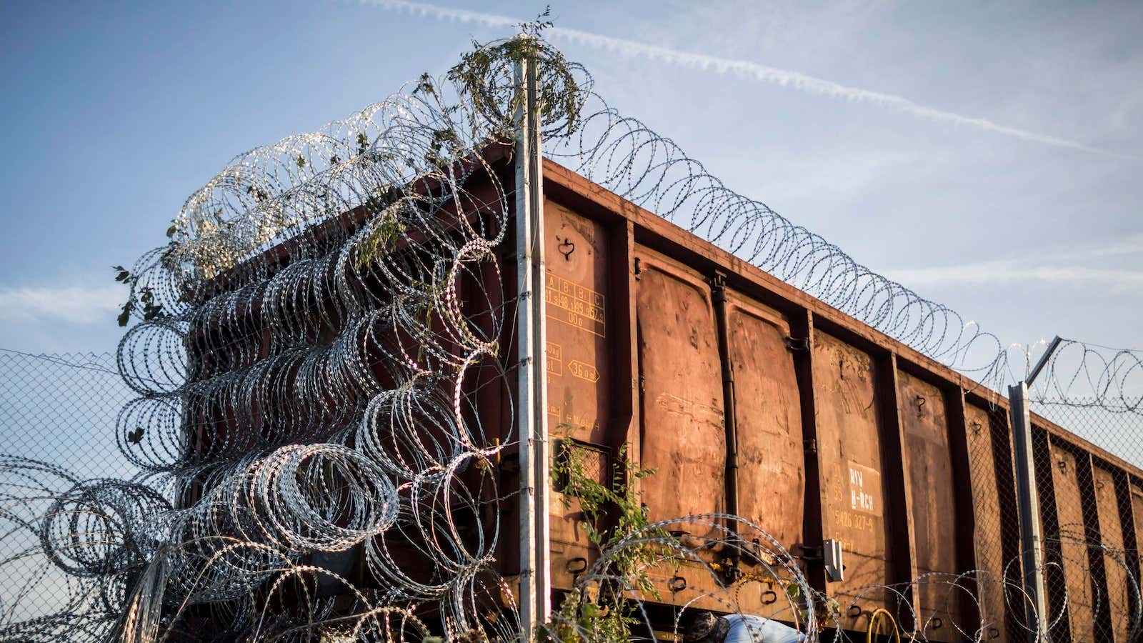 Sealing off the border between Hungary and Serbia with razor wire.