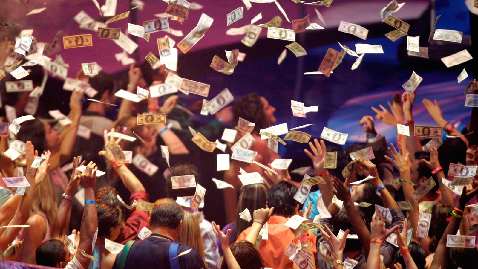 Money rains down during a Kanye West and Jamie Foxx performance of “Gold Digger.”