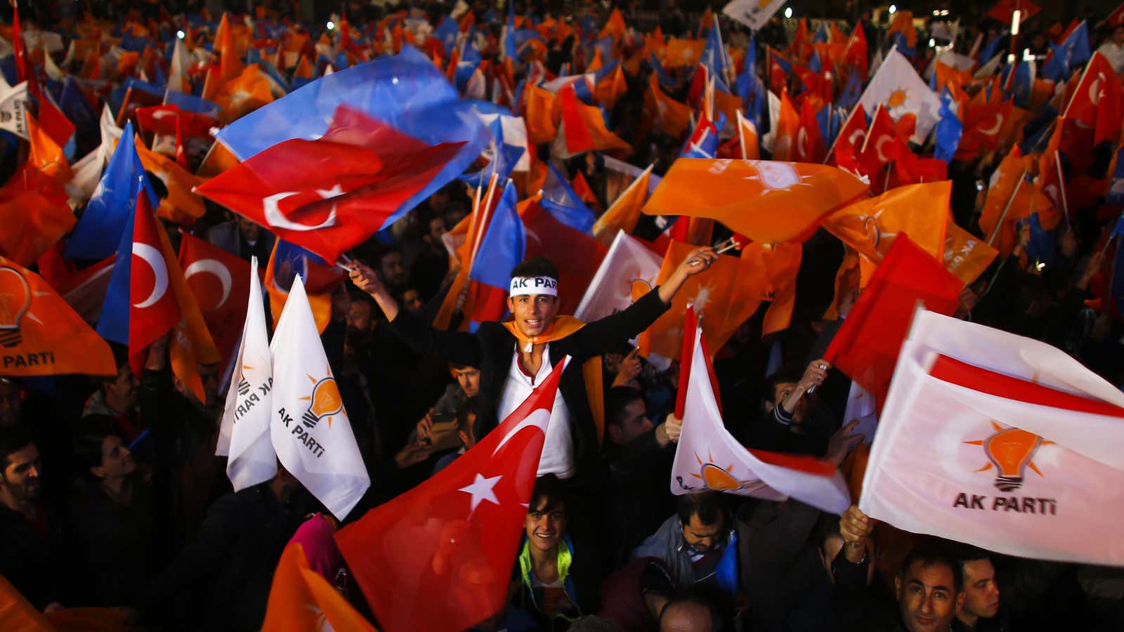 Revelers celebrate an AKP victory outside party headquarters in Ankara.