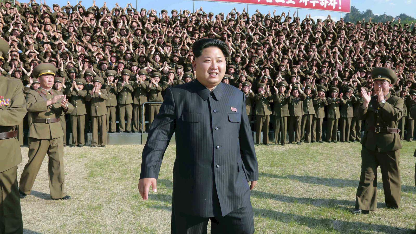 North Korean leader Kim Jong Un makes an inspection at the commanding headquarters of the 264 Combined Forces, in this undated photo released by North…