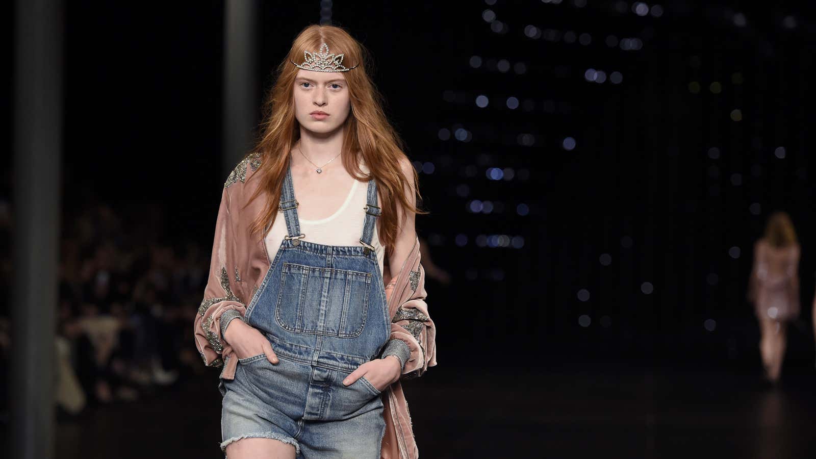 High-fashion cutoff overalls at Saint Laurent.