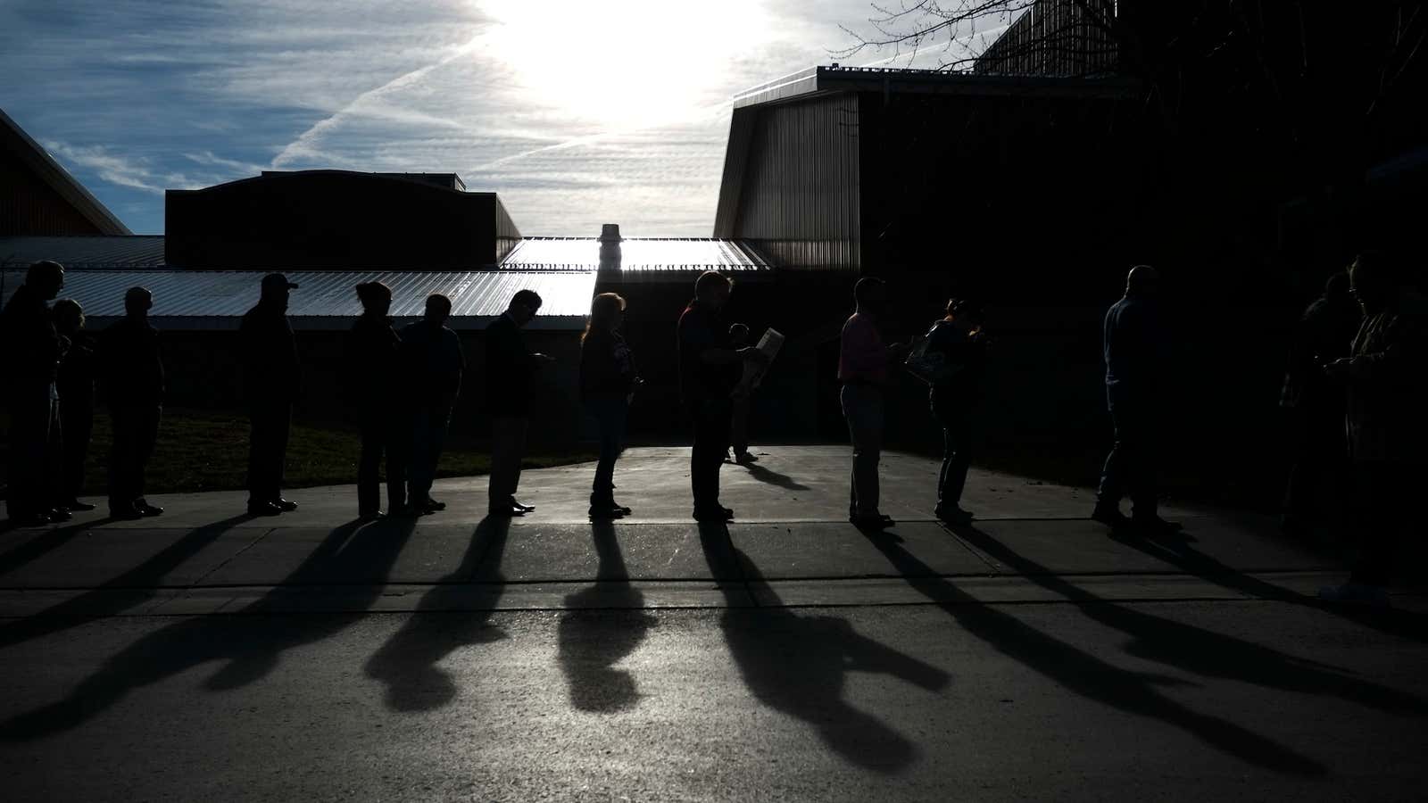 Voters wait outside at sunrise in Billings, Montana, to cast their ballots. Is there a better way?