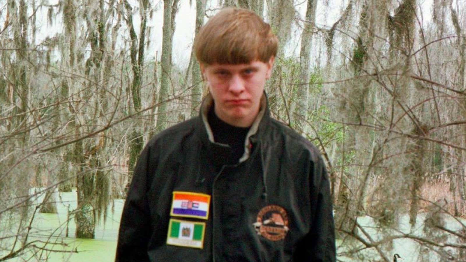 The flags of racist, defunct, African states are on Roof’s jacket.