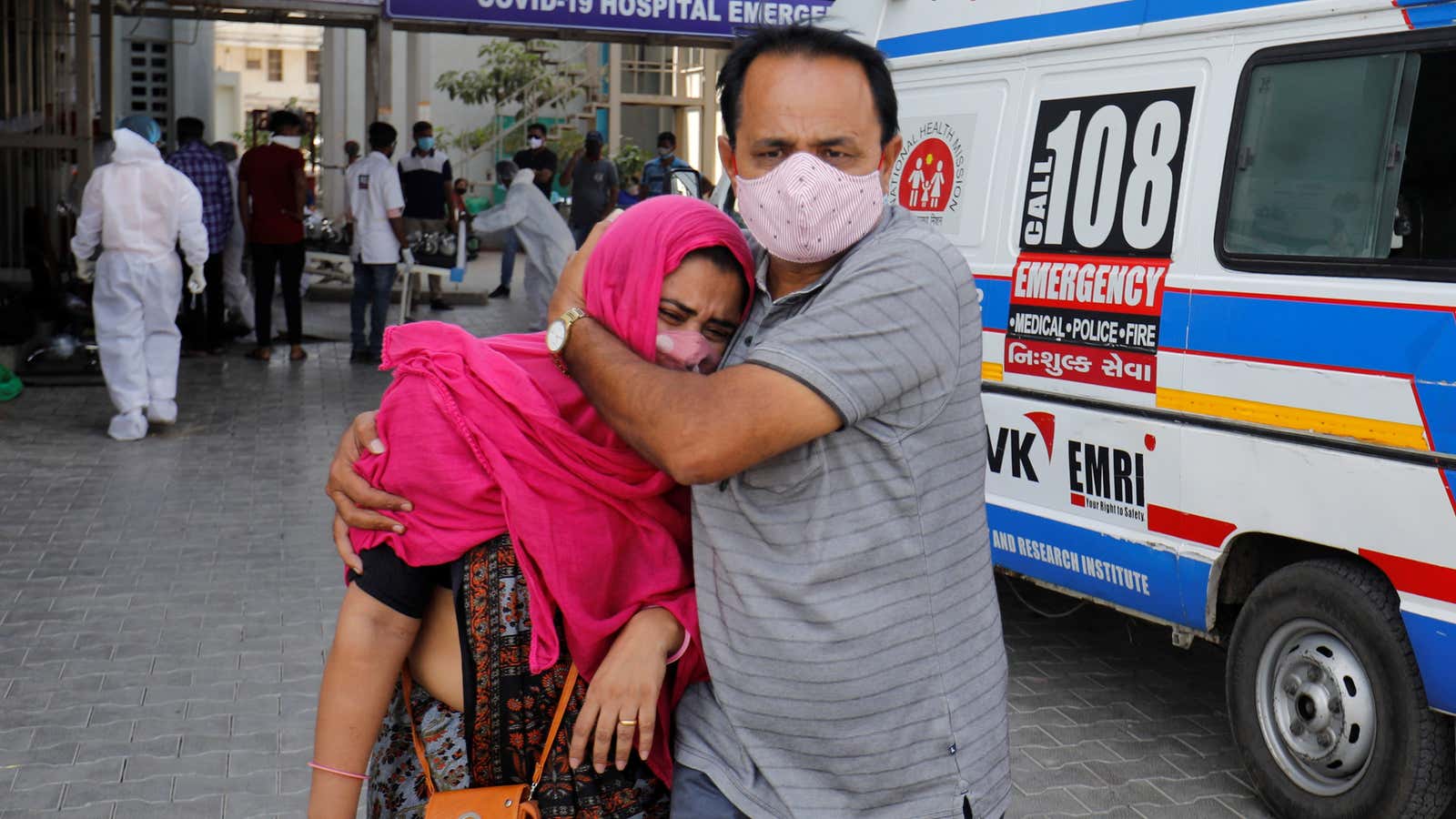 A woman is consoled, after her relative died due to the coronavirus disease (COVID-19) outside a COVID-19 hospital in Ahmedabad, India, April 19, 2021. REUTERS/Amit…