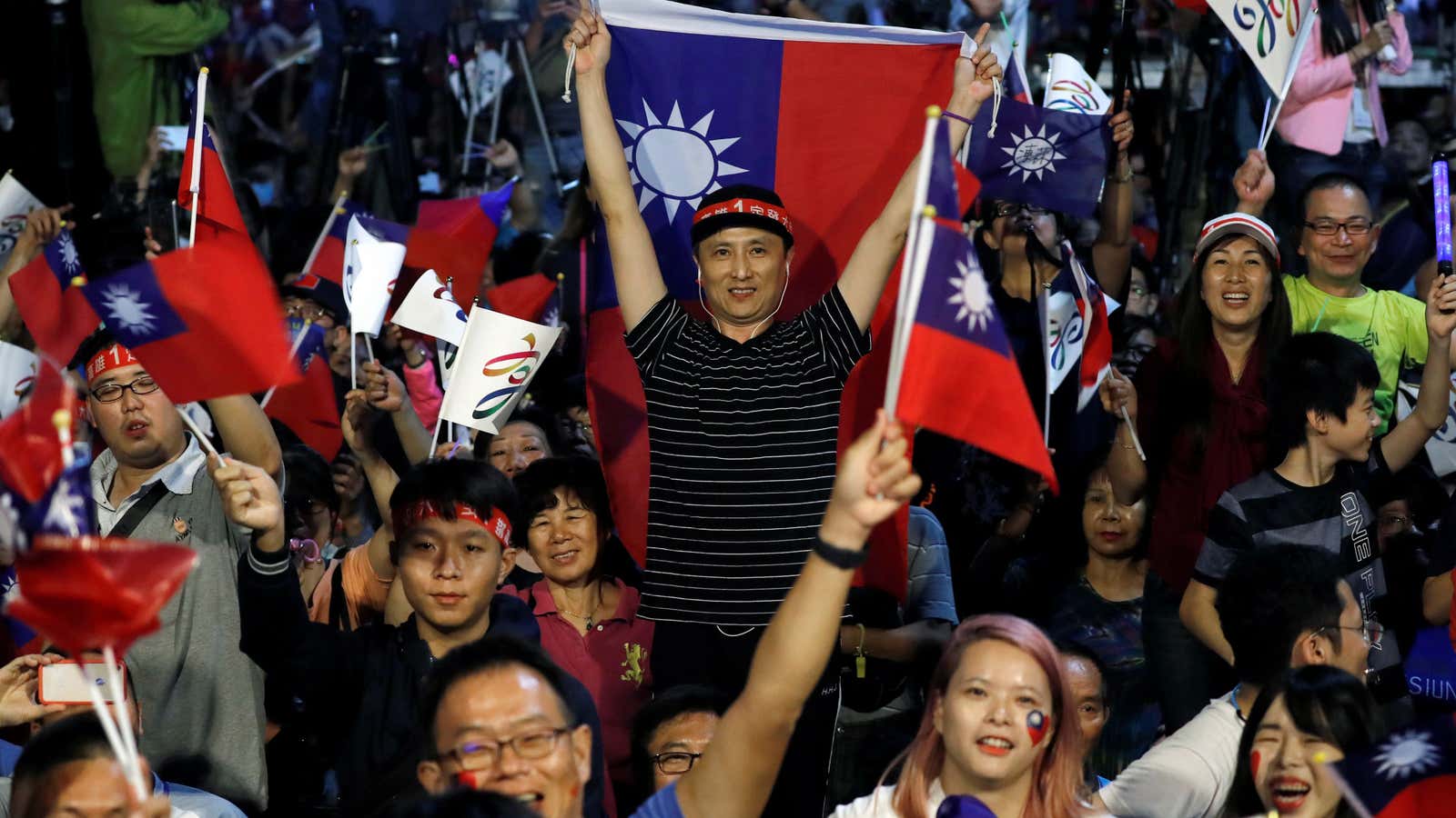 KMT supporters in Kaohsiung celebrate a win in Taiwan’s elections.