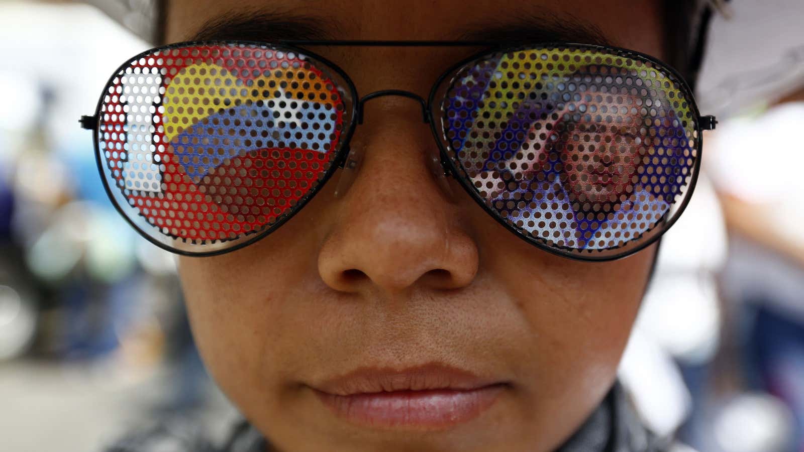 Venezuelan stocks are as hot as this kid’s shades.