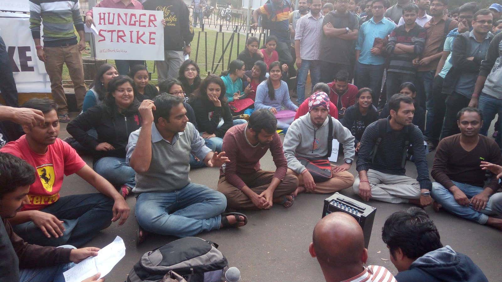 Students demonstrate for a rollback of the fee hike decision.