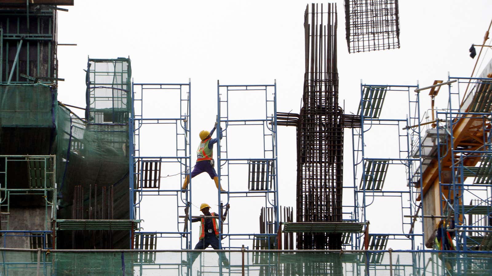 Construction workers in Jakarta; will the US finance the next project they work on?