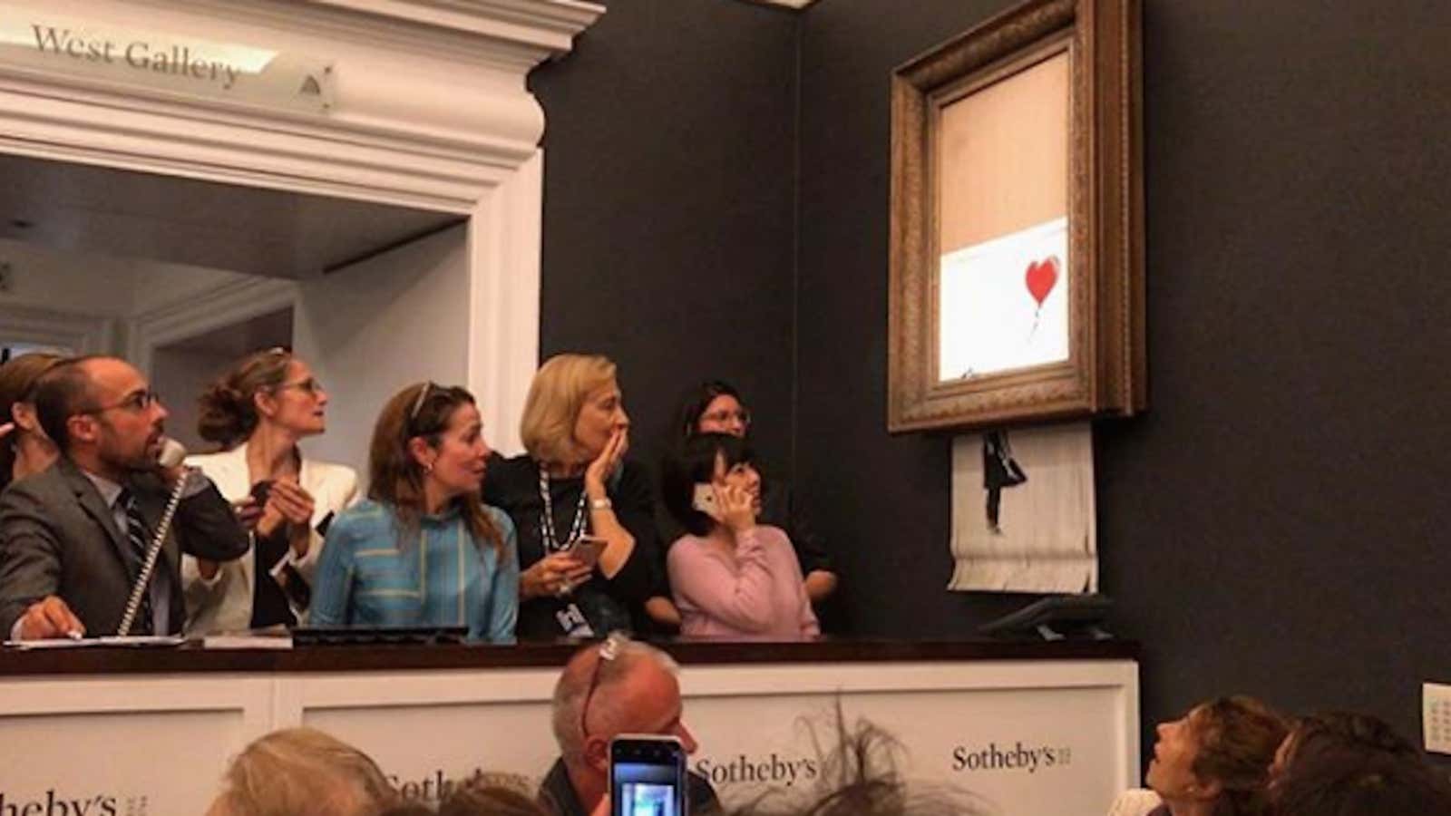 Why Banksy shredding the