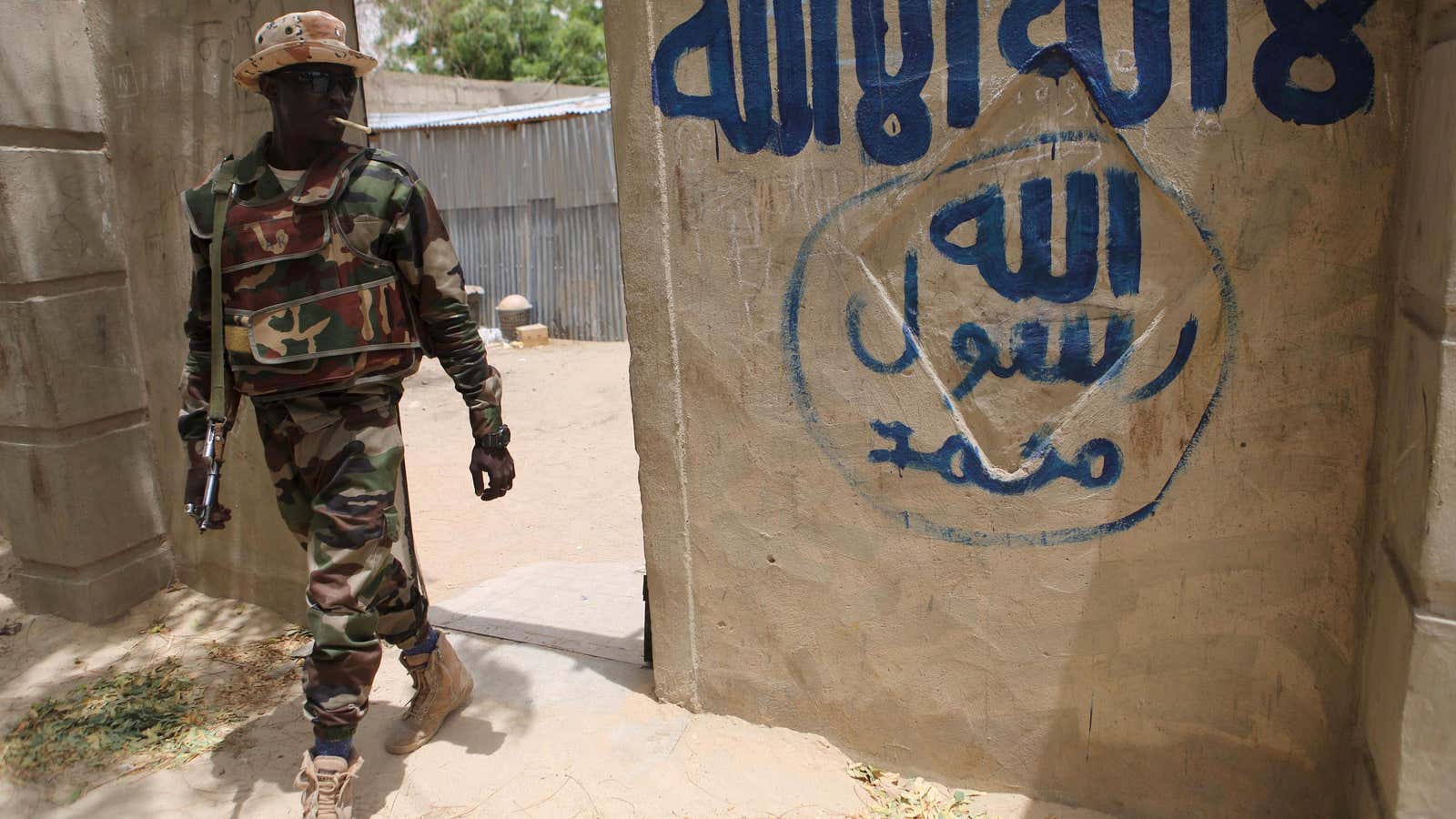 A Nigerien soldier taking on Boko Haram  in Damasak, Nigeria