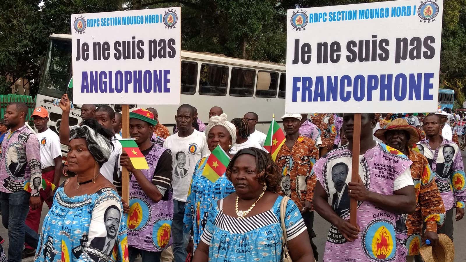 Demonstrators carry banners as they take part in a march voicing their opposition to independence for the Anglophone regions, in Douala, Cameroon October 1, 2017.