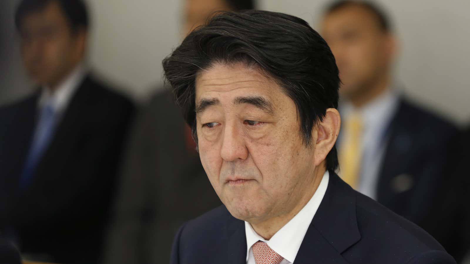 Japan’s prime minister Shinzo Abe reacts at a meeting on two Japanese hostages taken by the Islamic State group.