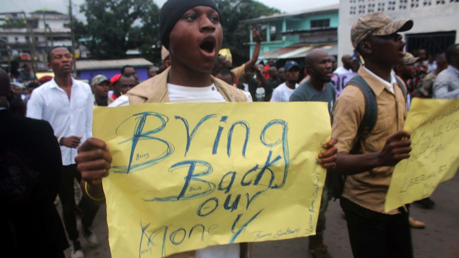 “Bring back our money!” A demonstrator in Monrovia, Liberia