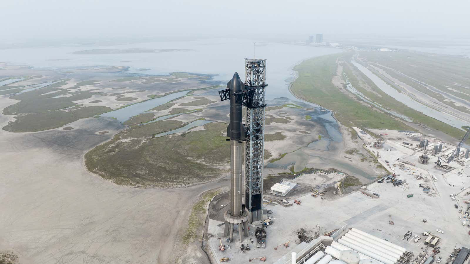 The Starship and its Super Heavy booster on the launch pad in Boca Chica, Texas.