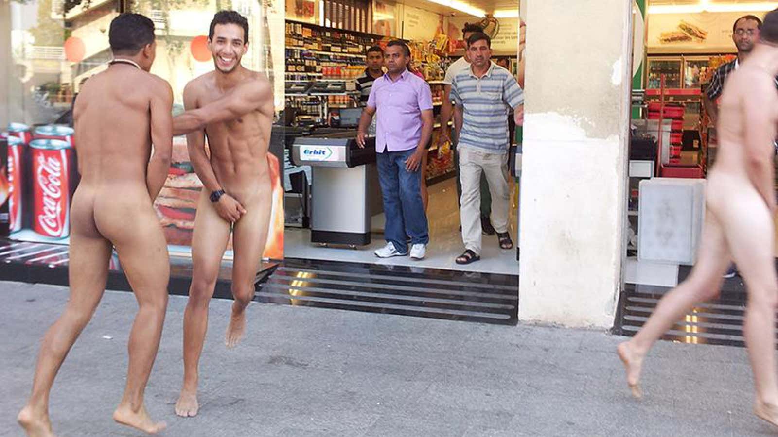 Naked tourists in Barcelona