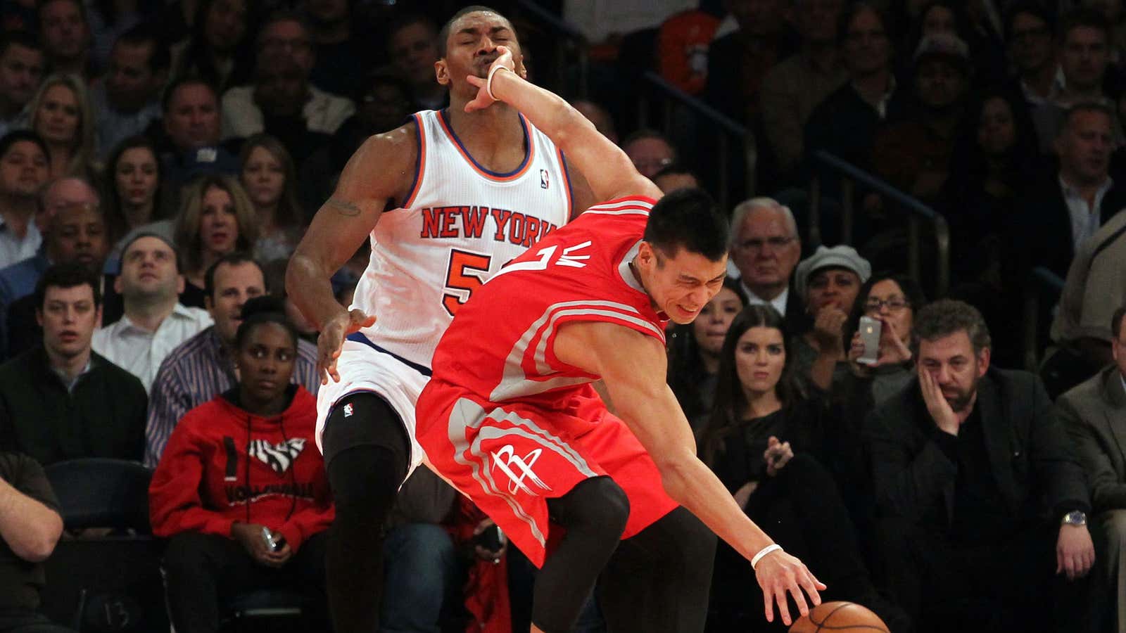 Metta World Peace gets fouled by Jeremy LIn, also popular among Chinese fans, during a game in 2013.