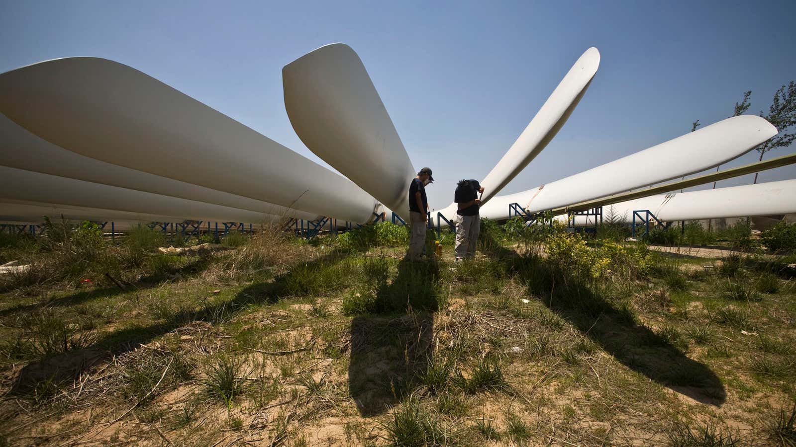 Painting the blades of a wind turbine at a factory in China’s Hebei province.