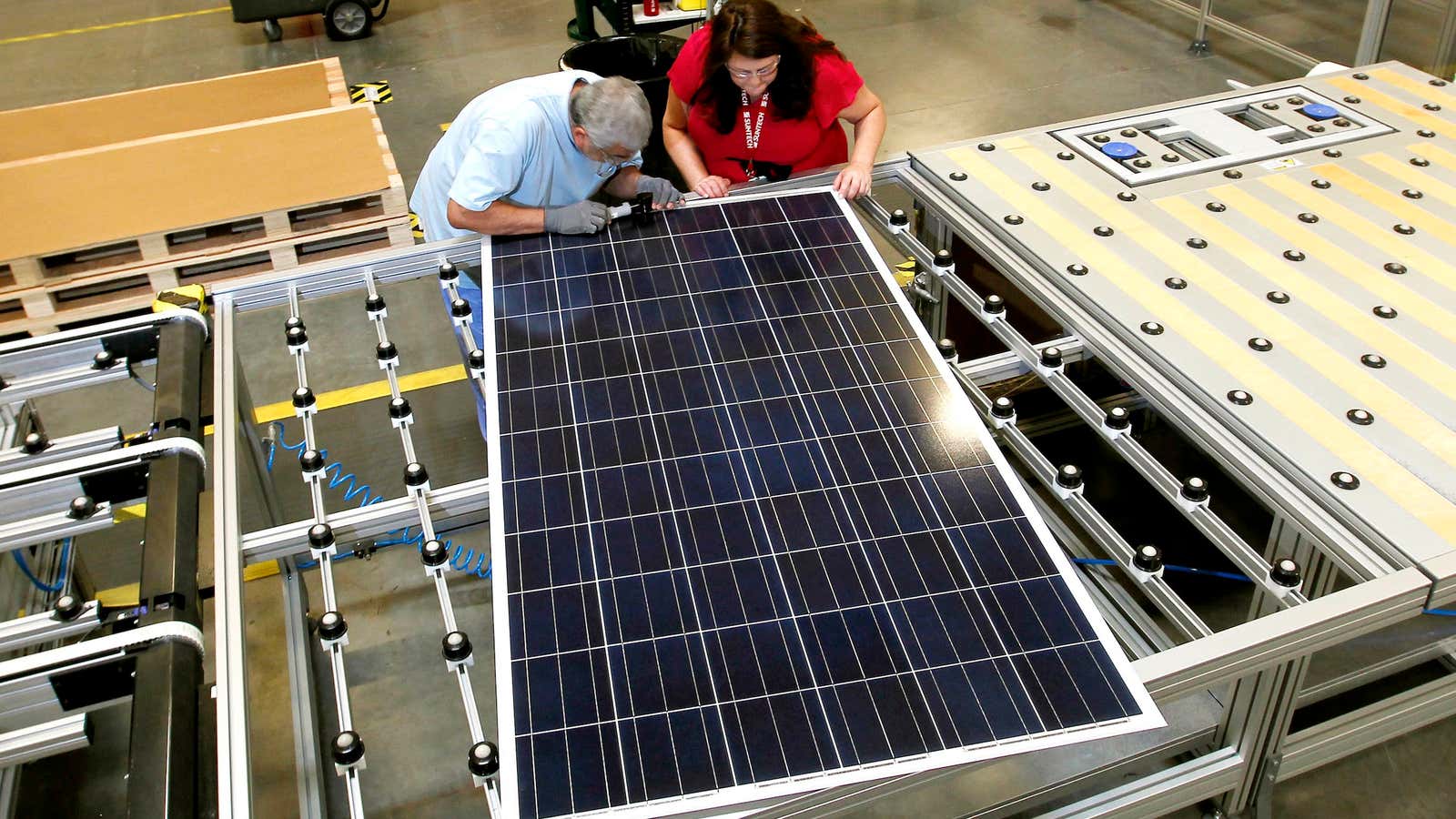 Workers at Suntech’s only US solar panel plant, in Arizona, which the Chinese company plans to close.