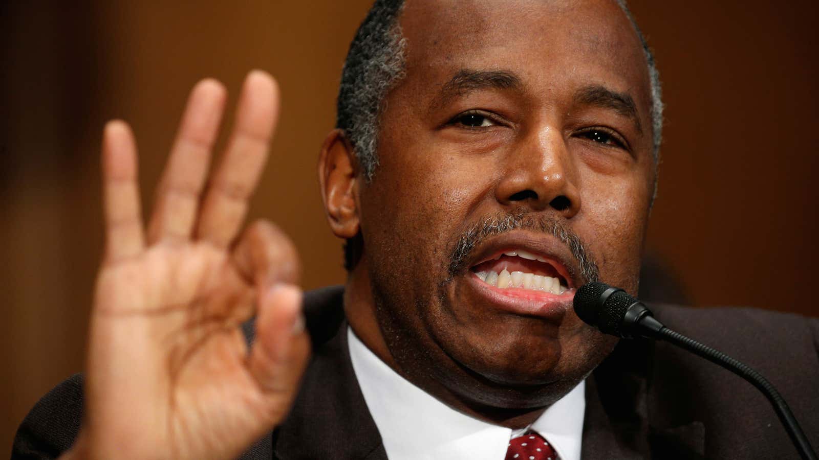 Dr. Ben Carson testifies before a Senate Banking, Housing and Urban Affairs Committee confirmation hearing.