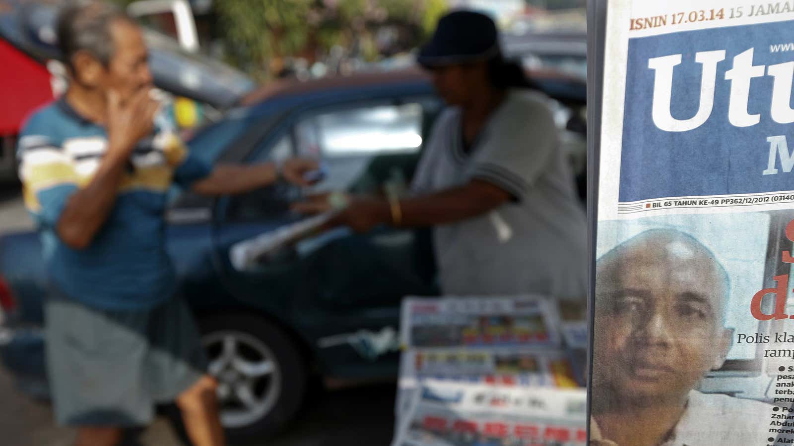 A front page picture of Zaharie Ahmad Shah on a newspaper sold near Kuala Lumpur International Airport.