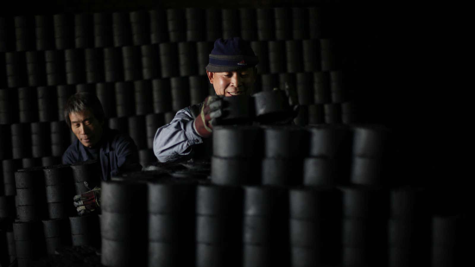 At work, at a Beijing coal depot.