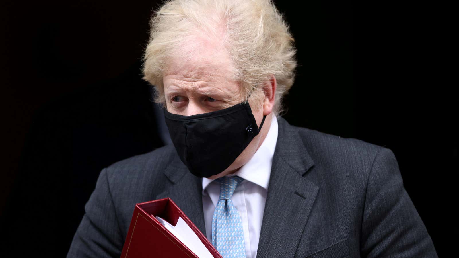 Under that mask, it’s British prime minister Boris Johnson.